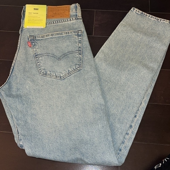 Levi's® Premium
502™ TAPER FIT MEN'S JEANS
Size 33X34 NWT - Picture 4 of 10